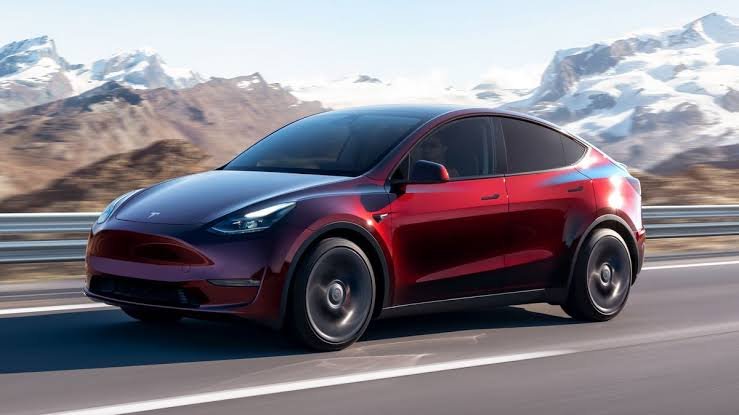 Business professionals discussing electric vehicle requirements